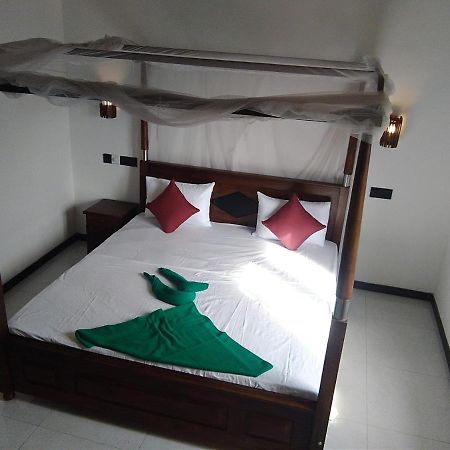 Dolphin Cottage Мирисса Экстерьер фото
