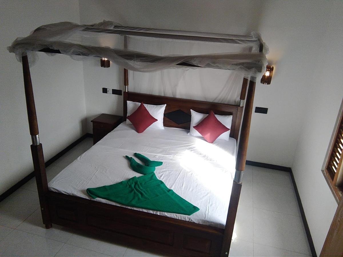 Dolphin Cottage Мирисса Экстерьер фото